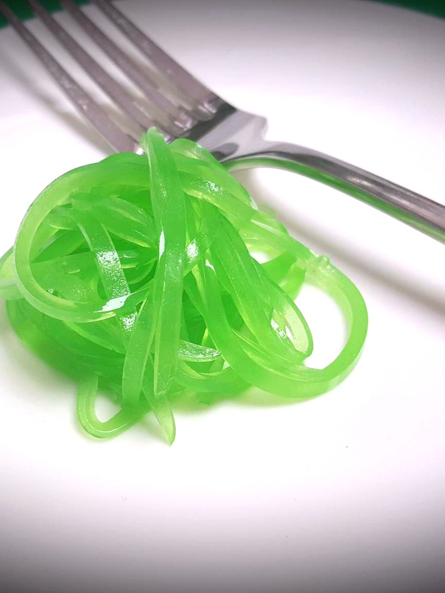 Green garnish detail with fork